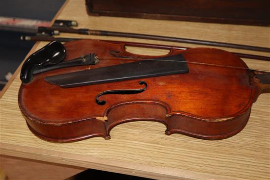 A French violin labelled J.B. Henry a Paris 1823 and two bows